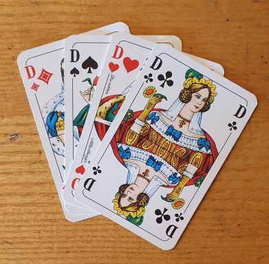 vier Damen aus einem Kartenspiel